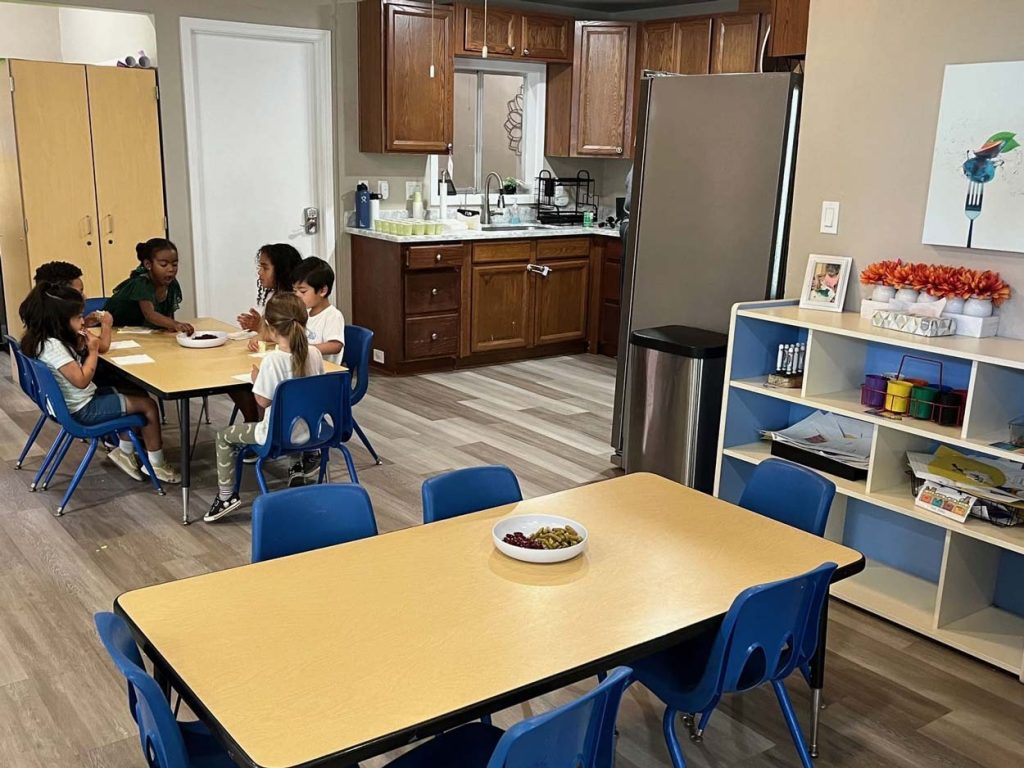 Concord 6 Sunshine House, CA Concord preschool classroom, children eating snack at table