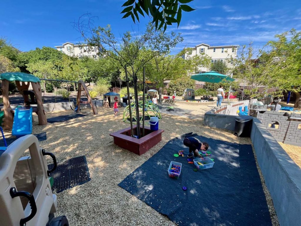 Martinez 3 Sunshine House, CA Martinez preschool classroom, children and teacher, outside 1