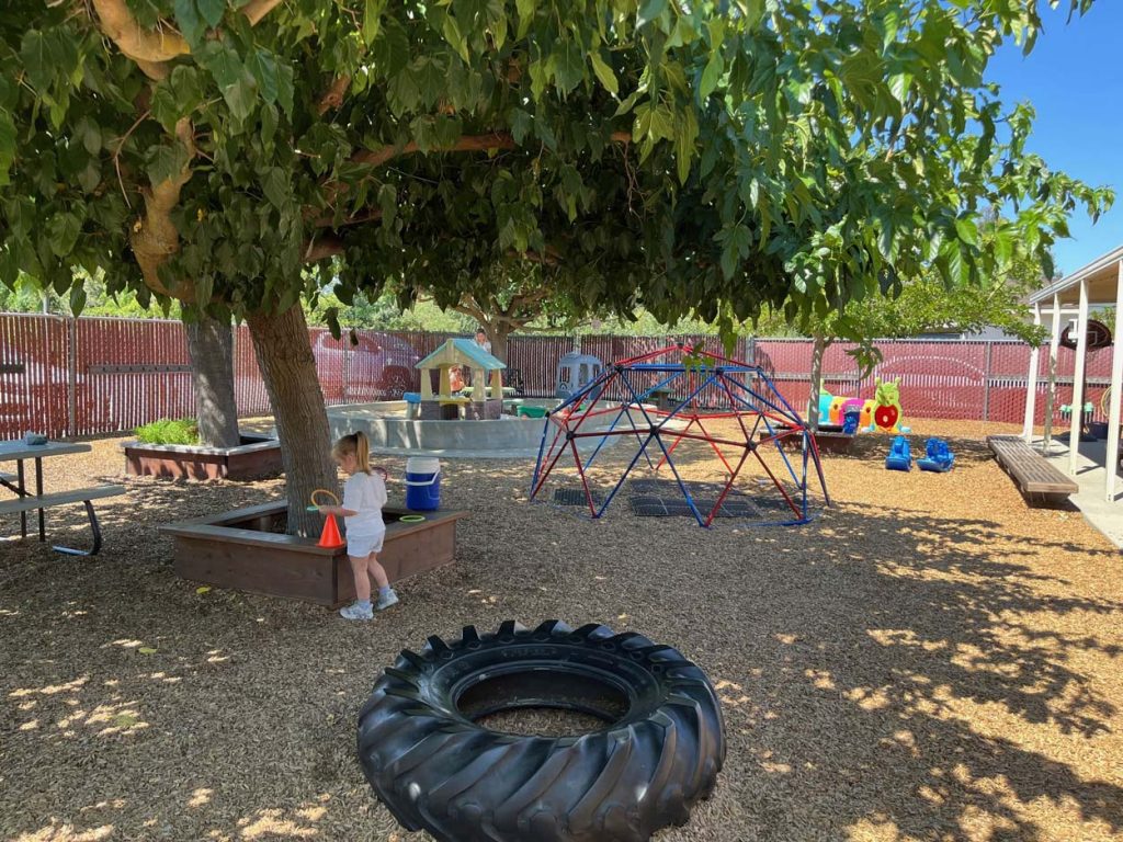 Oakley 6 Sunshine House, CA Oakley preschool classroom, children and teacher, outside 4