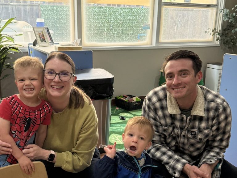 Reviews 8 Sunshine House family with two sons in the classroom