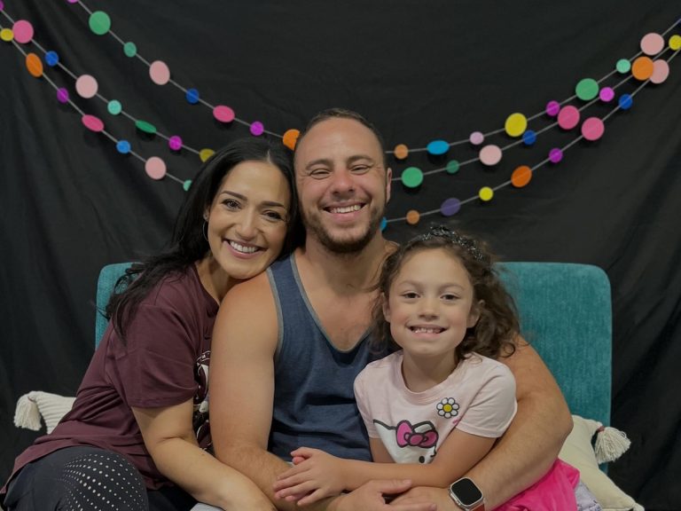 Reviews 22 Sunshine House family celebrating together with their daughter